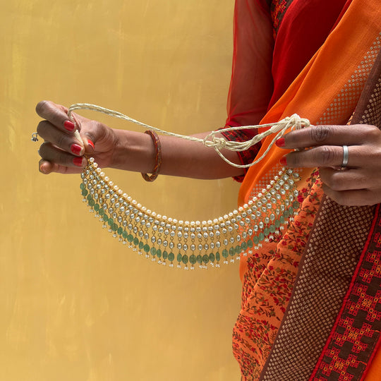 Classic Monochrome Three-Layer Kundan Necklace With Semi-Emeralds