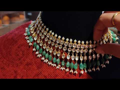 Classic Monochrome Three-Layer Kundan Necklace With Semi-Emeralds